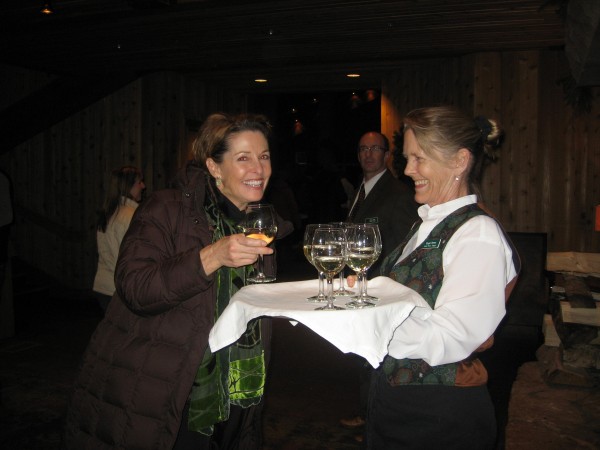 Deb Lewis from the Park City Visitors Center is greeted with a glass of wine