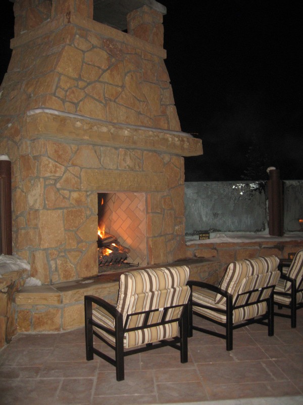 Cozy up to the outdoor fireplace
